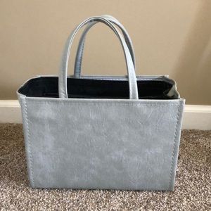 Light grey rigid sided tote bag